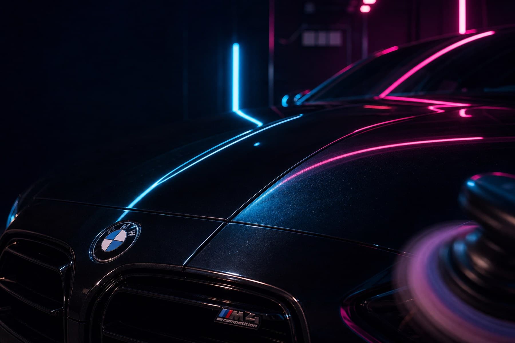 Paint reset, decontaminated, polished, protected — hood reflecting neon strip light